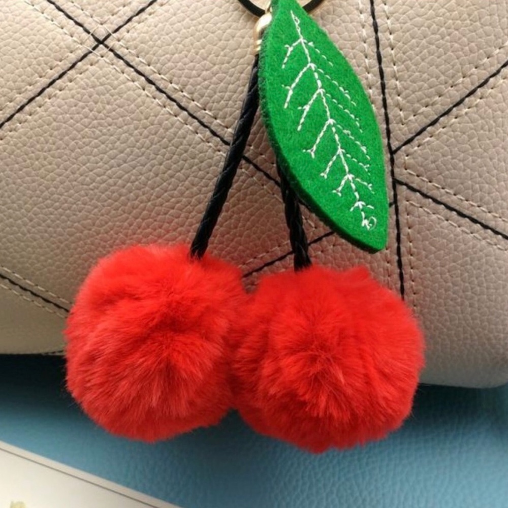 Red cherry pom pom